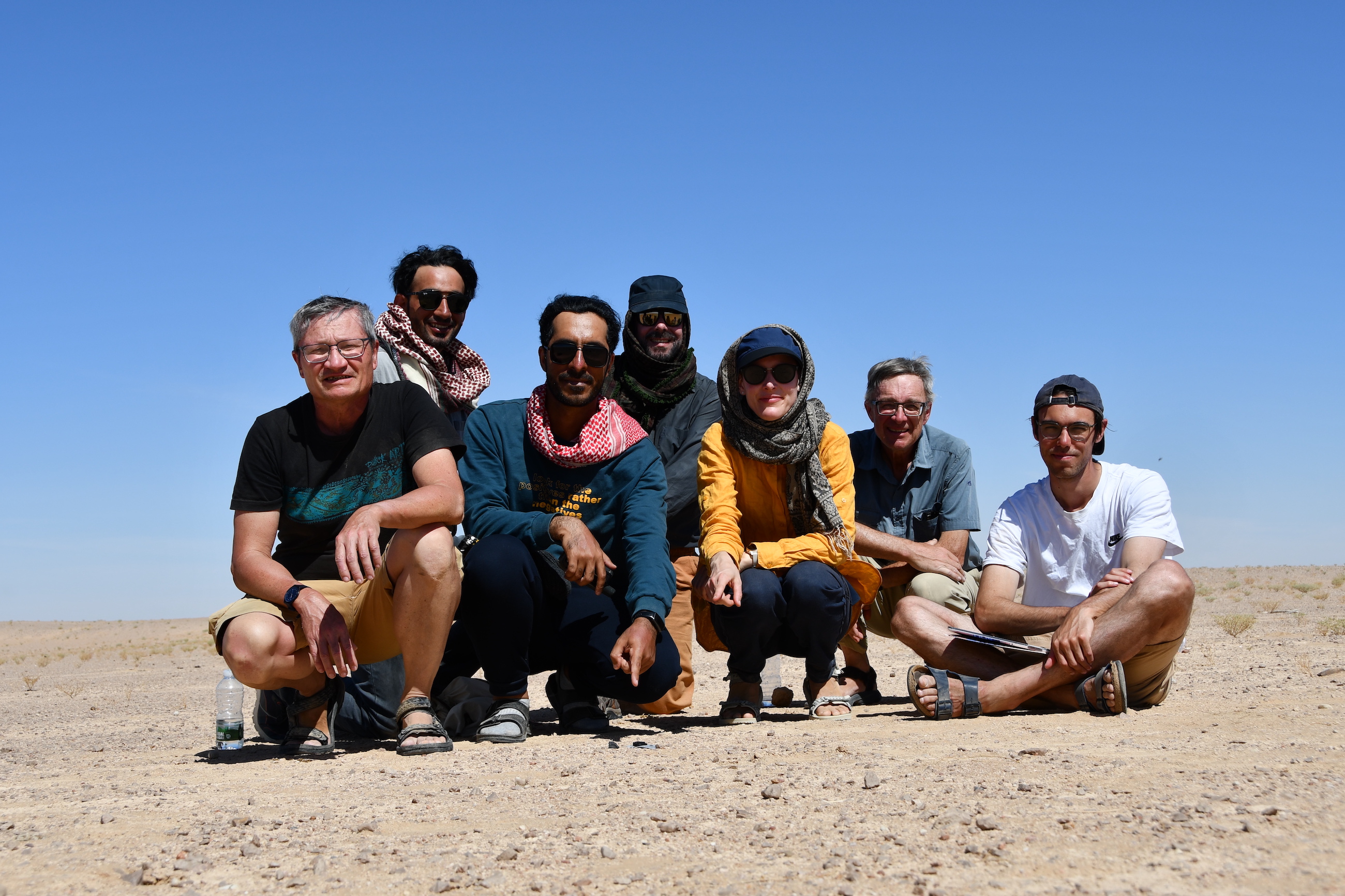 Omani-Swiss search team 2023 with the freshly found meteorite Al-Khadhaf